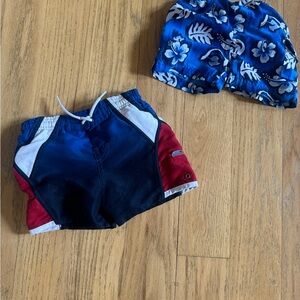 2 Pairs Of Boys Swim Trunks 12 Months